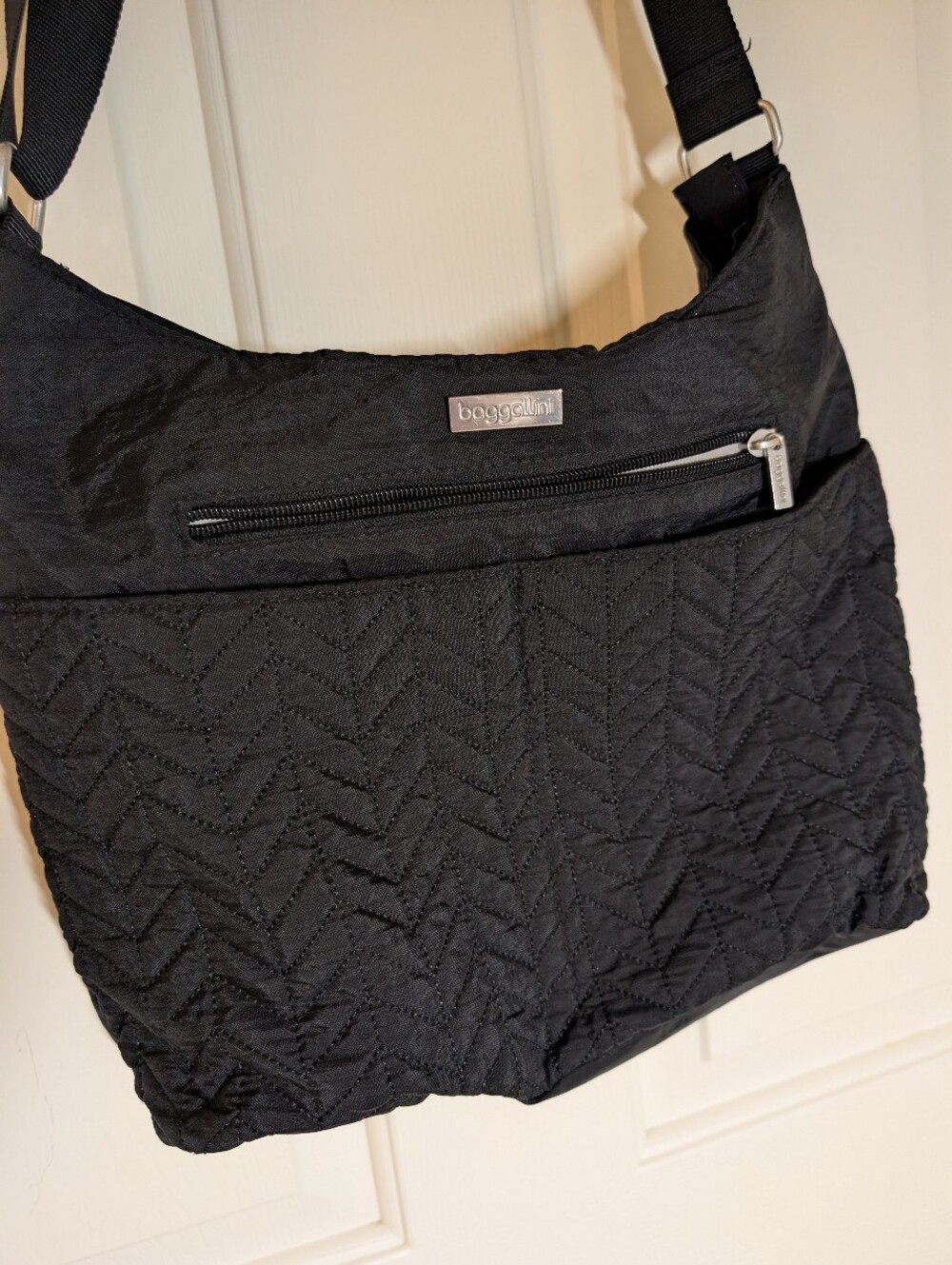 Baggallini Black Quilted Crossbody Bag with Adjustable Strap. Chevron Pattern